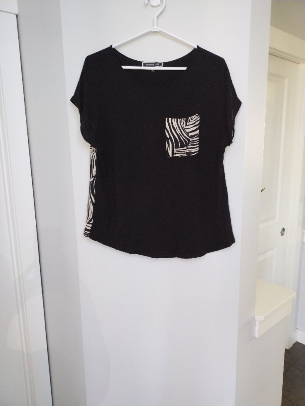 Sheer zebra print short sleeve Melanie Lyne top